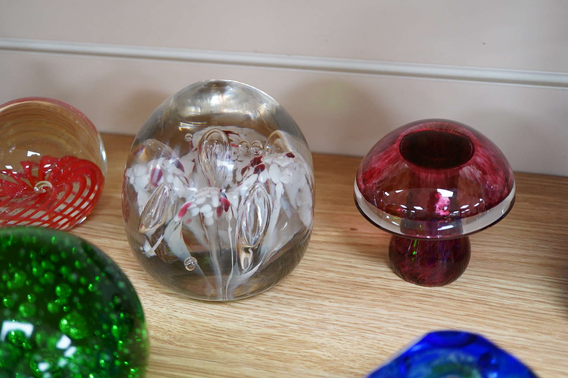 A large collection of 20th century paperweights to include Svaja, Mdina and some novelty examples in the form of animals, largest 27cm high